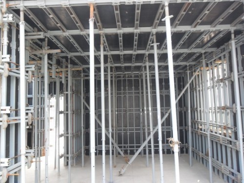 Adjustable scaffolding and formwork building system for wall